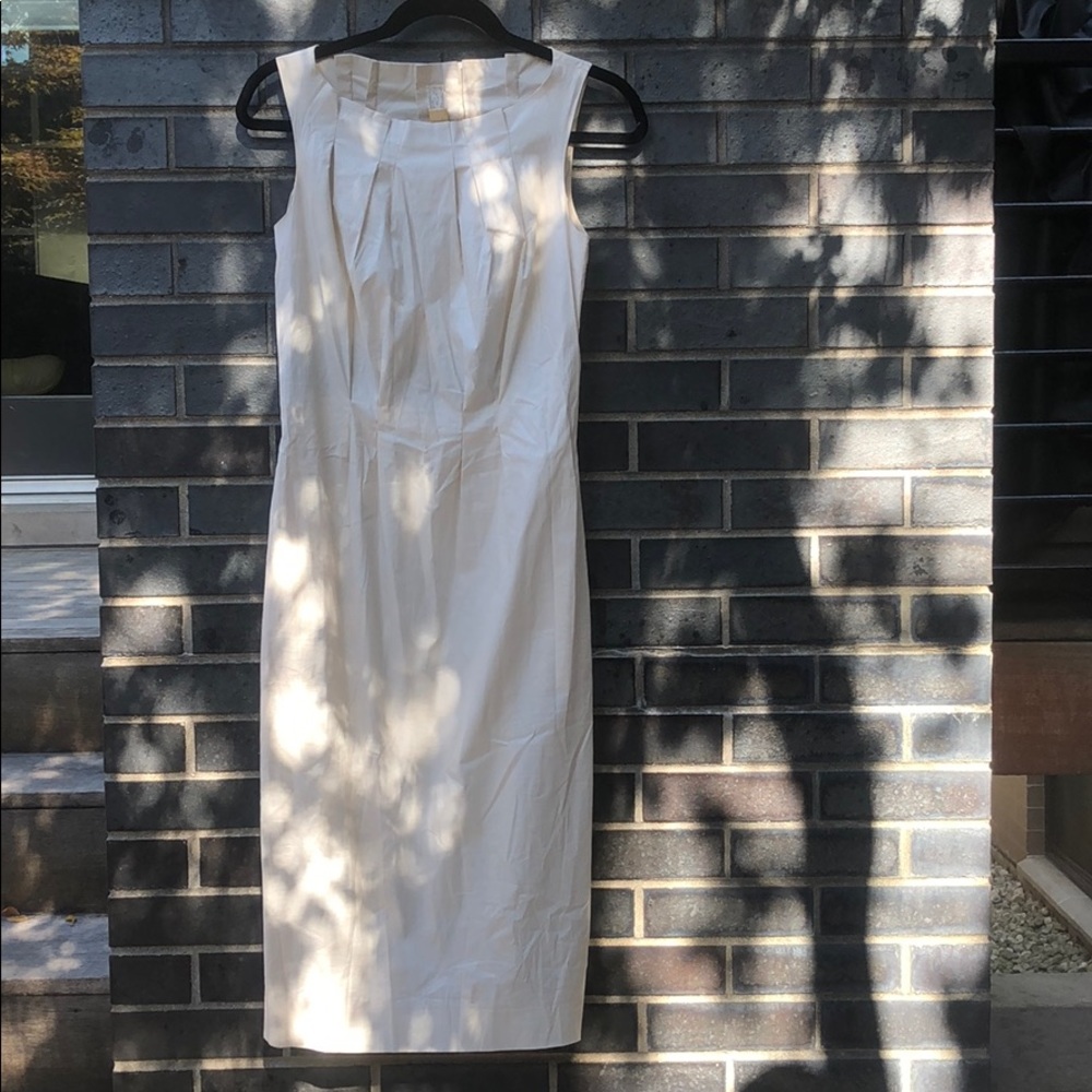 Nearly new blush/ cream dress with cut out back.